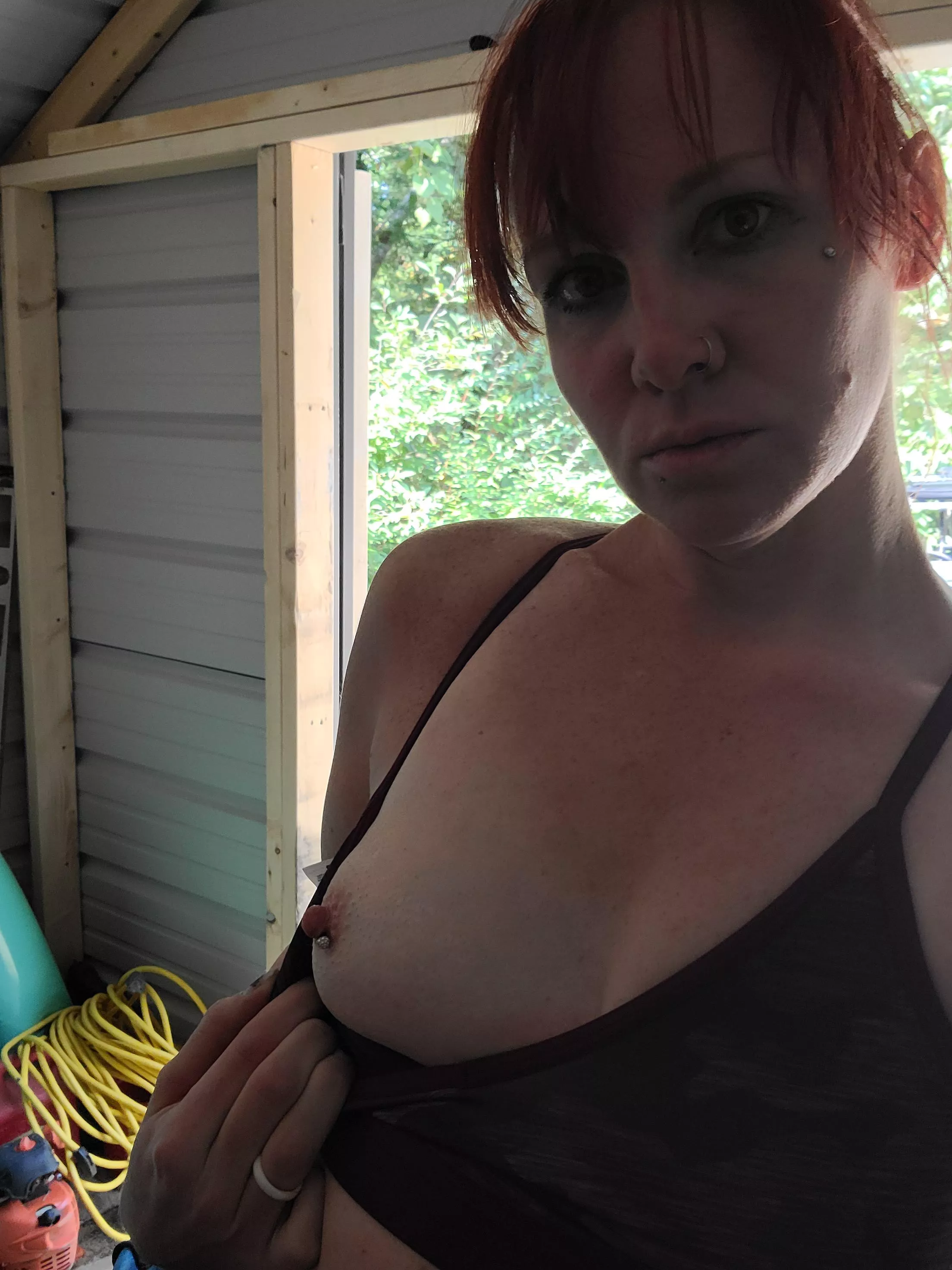 Doing yard work being naughty posted by SpicyR3dMilf