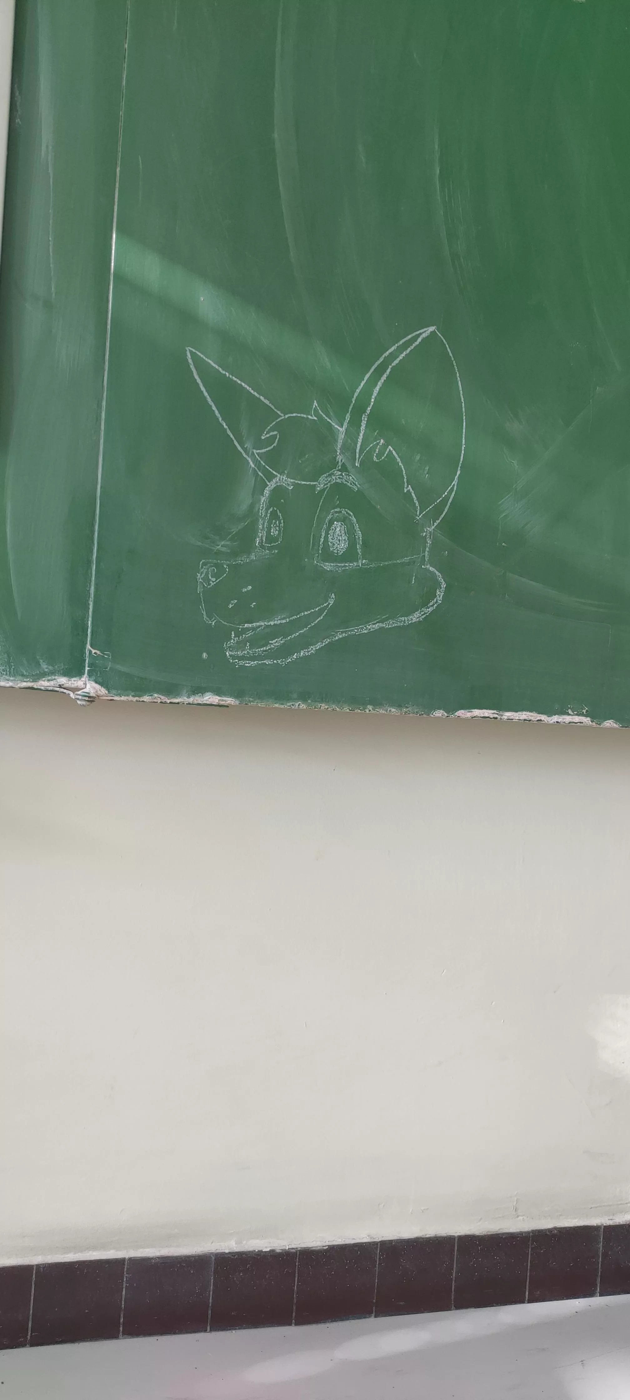 Drew this little doodle on the school board while waiting for my dad to come pick me up posted by RainbowWolf6112