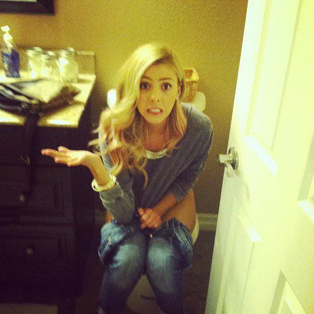 embarrassed girl strikes a pose posted by HoverPee