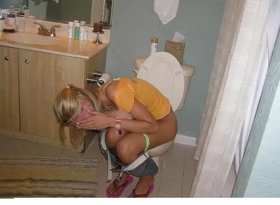 Embarrassed she was caught shitting! Nasty bitch! posted by rat_hos_exposed
