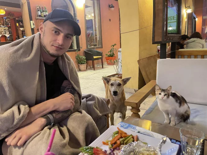 Enjoying dinner with friends. My favorite pic from vacation by Max_barz