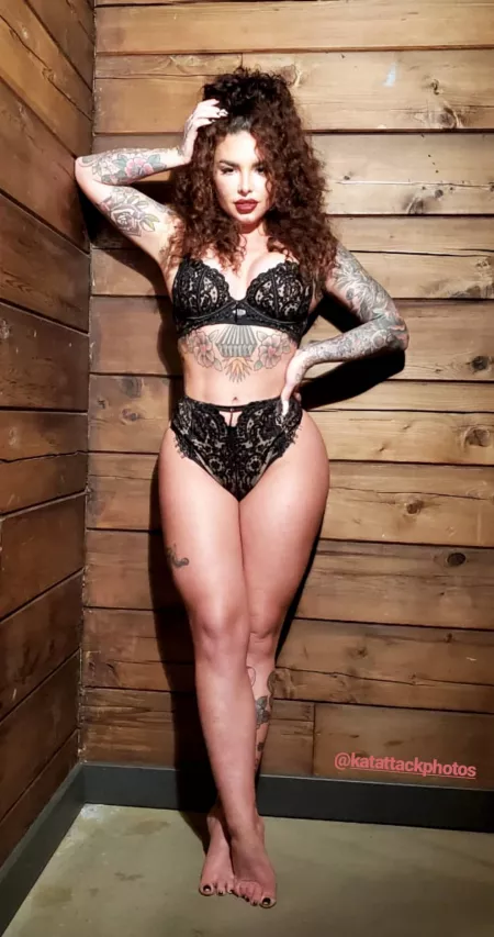 Even her legs are hot by [deleted]