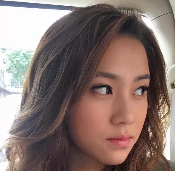 Facialize Tiffany LWS, 20. Hair dyed in brown. Looking to her left. posted by 0cana