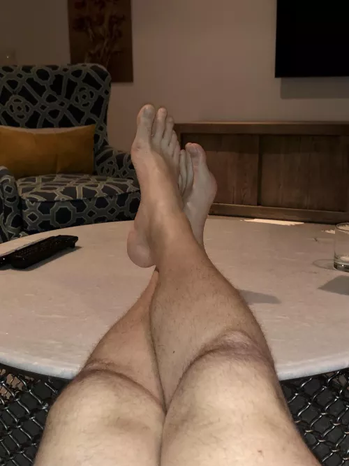 Feet up after a long day. Who wants to give these a foot rub? by Gentlemangiant345