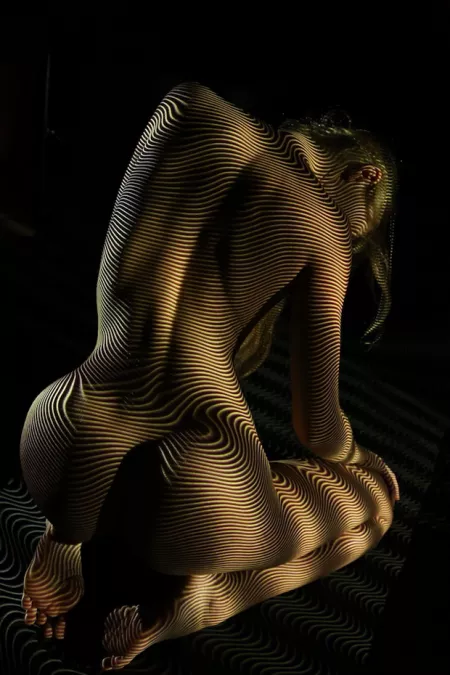 Female figure, clothed only in light (AIC) by mkraft