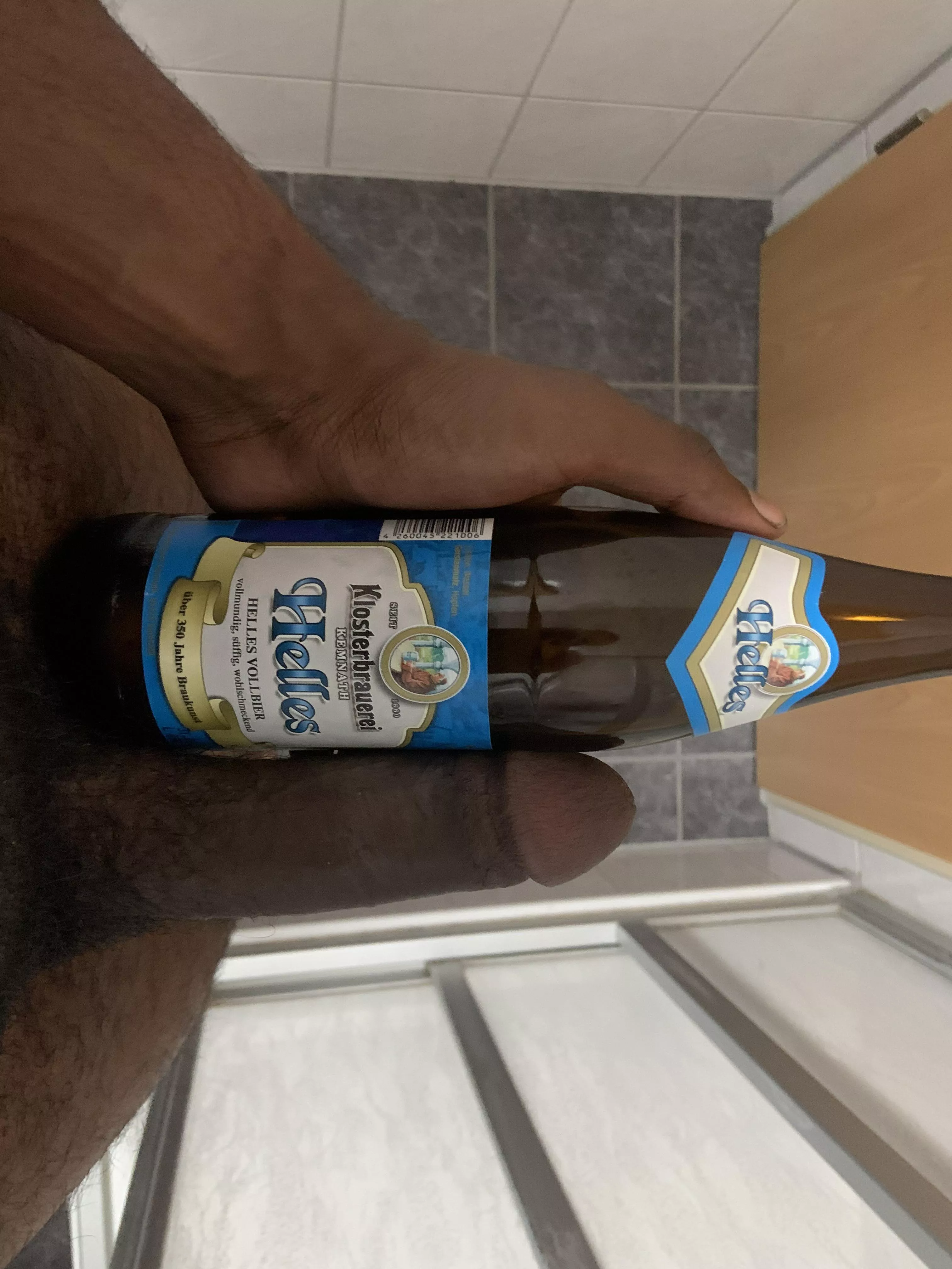 Flaccid dick next to a German beer. Maybe the next picture I’ll compare it while it’s hard. posted by CaptainHook370