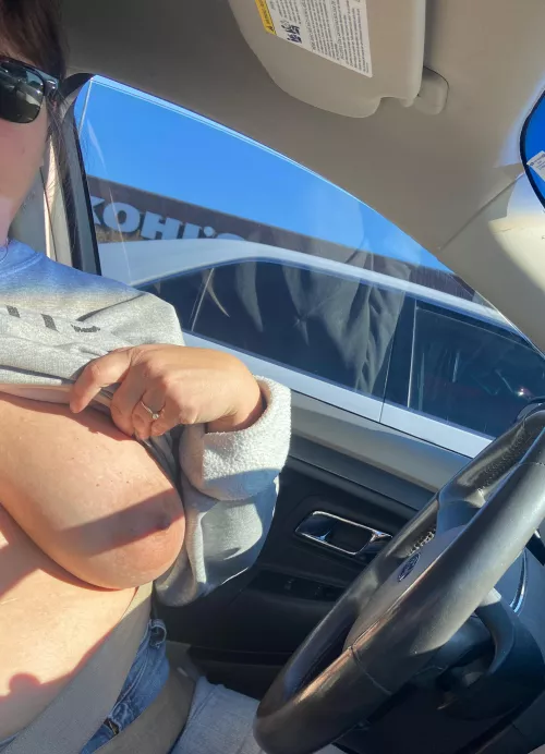 Flashing at the mall parking lot by Boobies1969