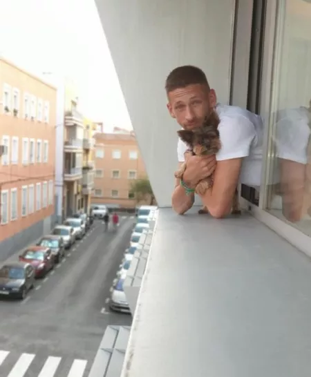 Found this gem in my old photos! Made me smile to see my old dog!!! (he never let me look out the window without holding him...that's why I'm holding onto him for dear life! Hahaha!) by XlBulgeNYC