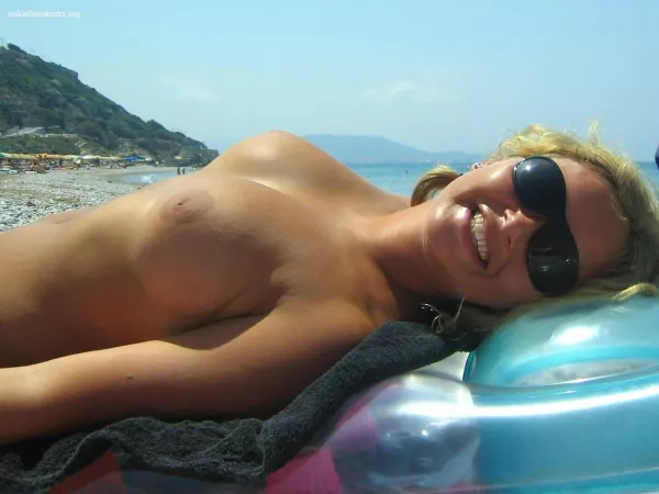 Getting her boobs tanned by Cunt_l_Puncher