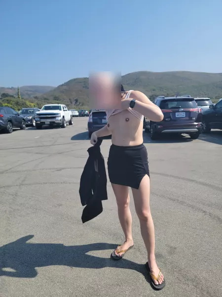 Getting the sand off in the beach parking lot. by flirtyleo