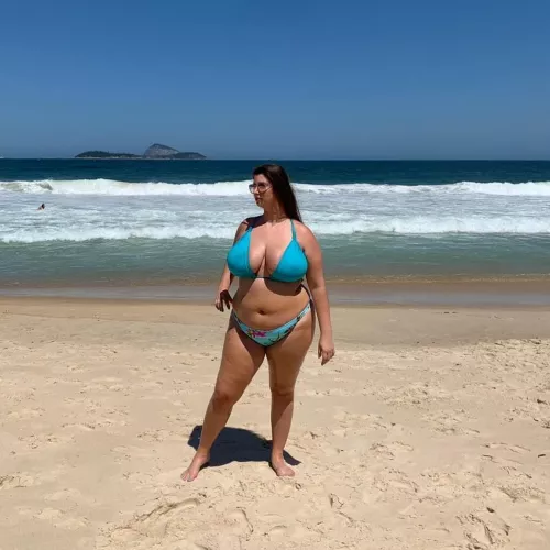 Gorgeous curvy bikini babe on a tropical beach by Udderluvr2020