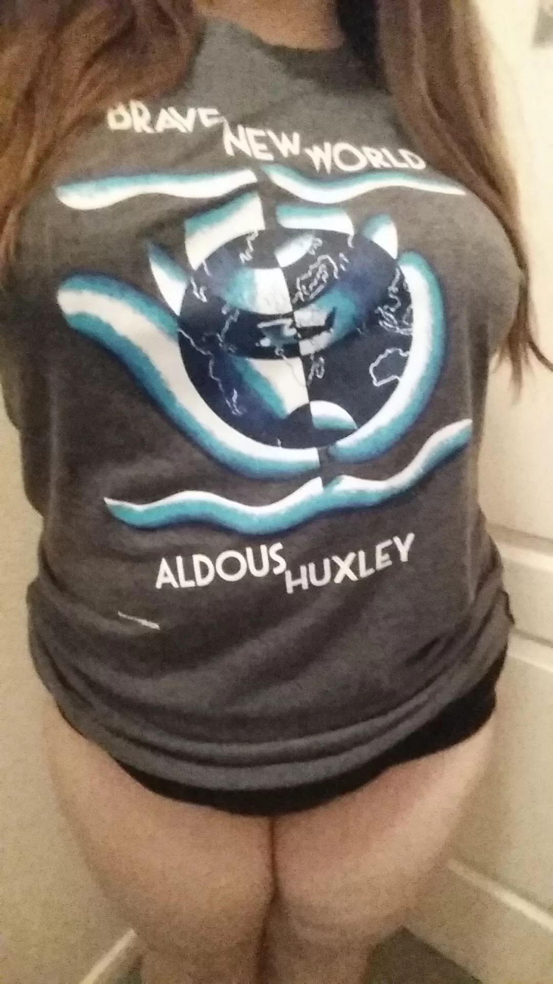 Got my favorite book on a t-shirt :) anyone want to see what's under it? posted by pleaseletmecum