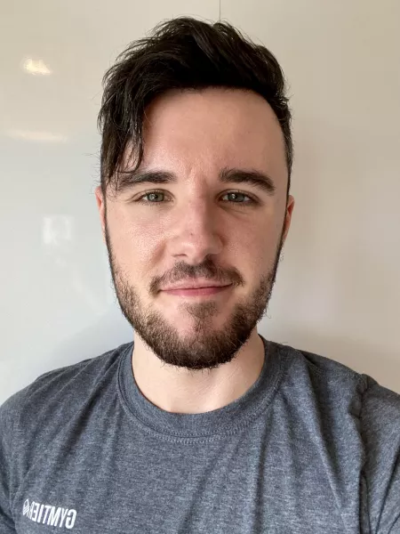 Got told my work photo looked like a prison mugshot. What do you guys think? by KaiDaniels2054