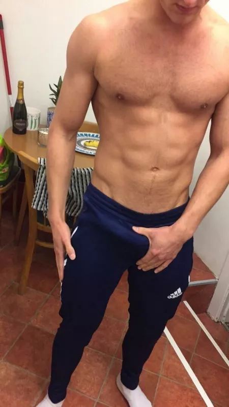 Grabbing his hard on (X-Post /r/guysinsweatpants) by menareamazing