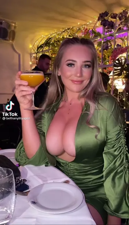 Green shirt with a bit of cleavage by Boring-Bed-Bug