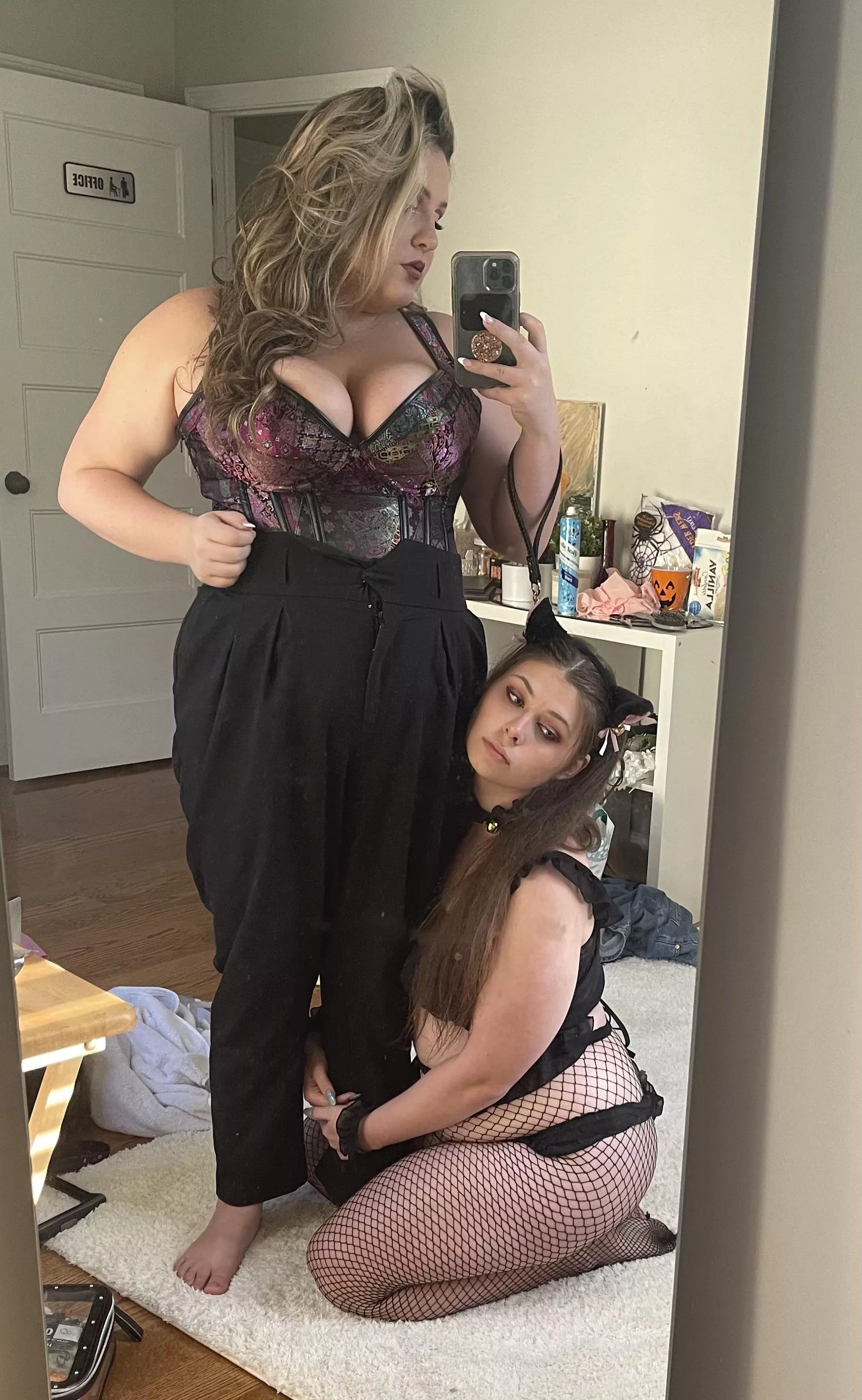 happy halloween from ur local black cat and her gf 🥰 posted by itsjennifersbody