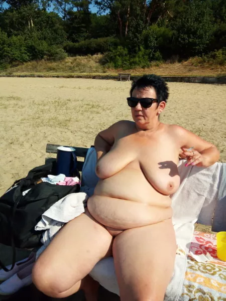 Having a smoke while chilling naked at the beach by Udderluvr2020