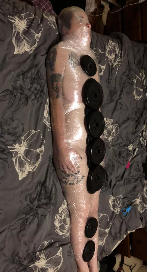 Having fun with gladwrap and weights. by Jasonkeating