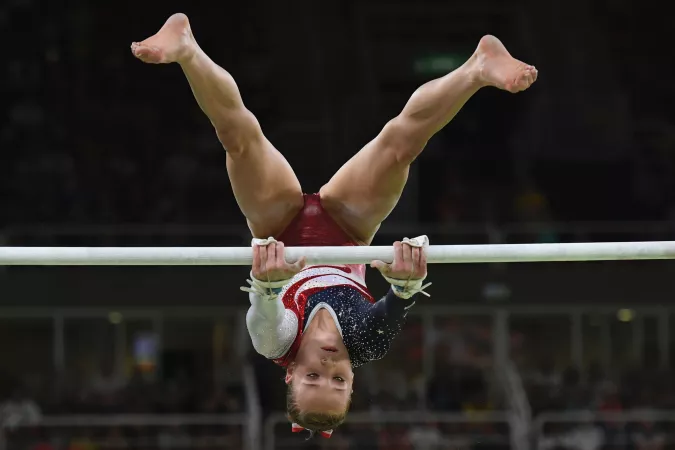 High resolution photo of Madison Kocian during the uneven bars at the 2016 Olympic Games by star_form_tree