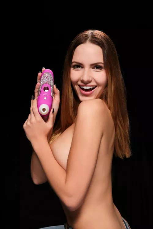 Holding a sex toy by cherylfan2022