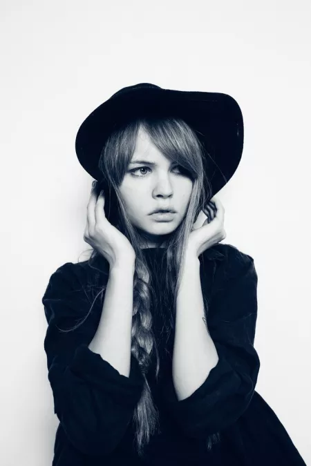 Holding on to her hat by [deleted]