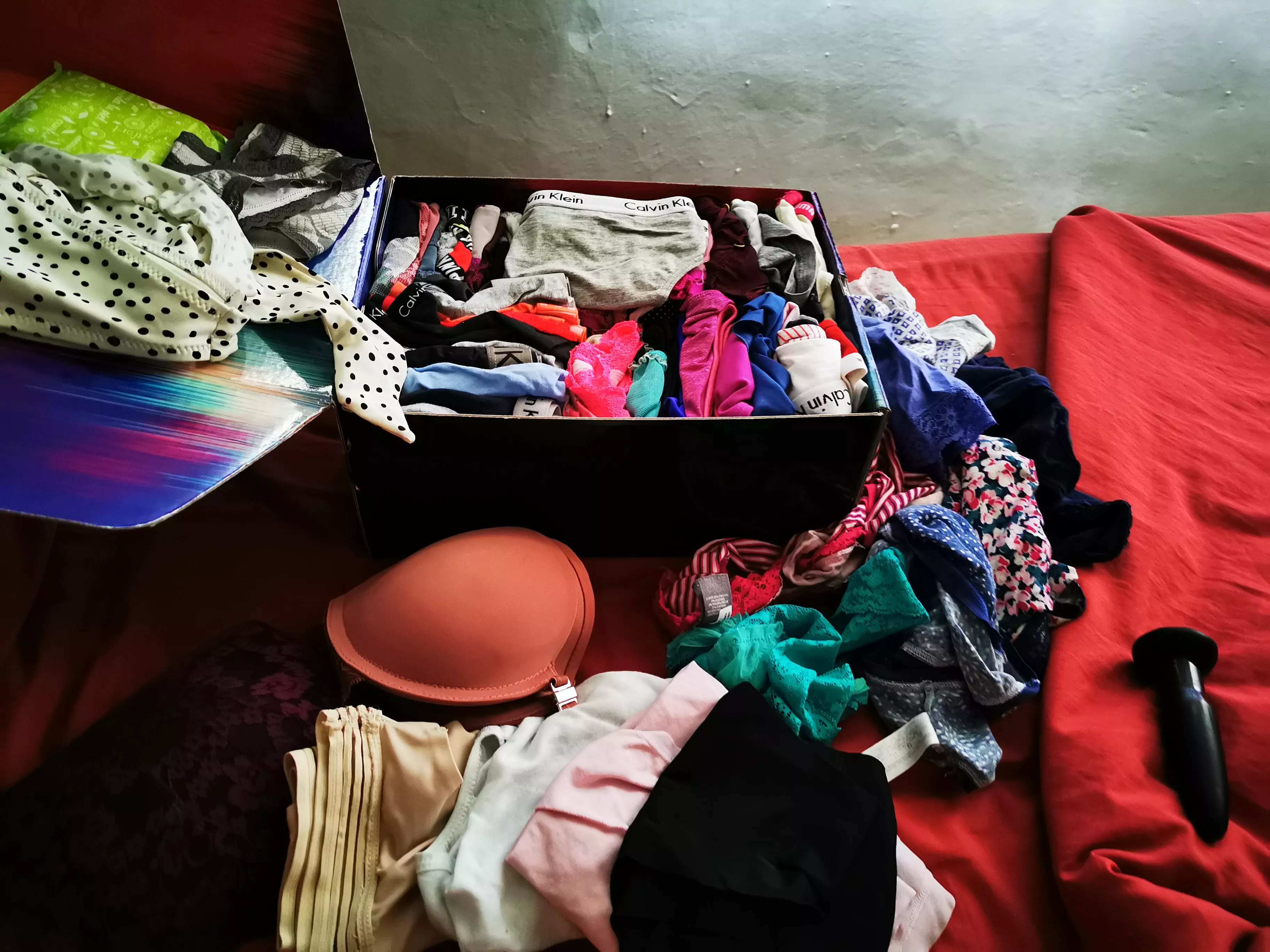 Home alone, the ones in the box are my collection, also the bras and the panties below, the one bext the box are my wife s dirty panties of the week. posted by guitarvic