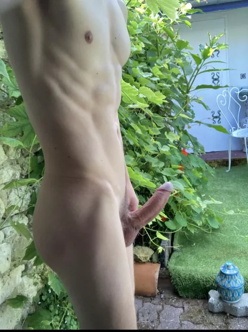 I am gardening outside again. Do I make you horny? My neighbor is secretly watching me and is having a boner in his sweatpants with a precum stain LOL 🙈🍆💦. by DamnSexyBator