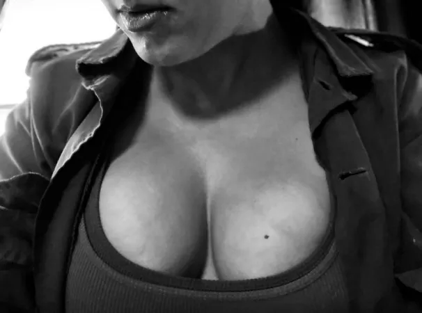 I have them strapped into two tight tank tops. Loving the drastic lighting here. by Emmerson-Reid