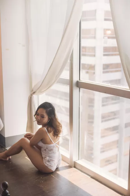 I lkie sitting by the winodw in this really awkward position, wearing bodysuit, and fully made up. £ by dlefula