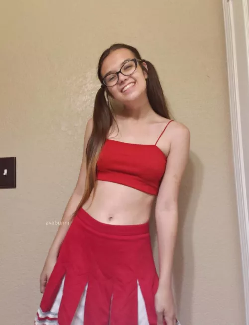 I love my cheer uniform with my pigtails by AvaBunni