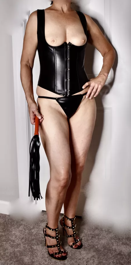 I LOVE wearing my dominatrix outfit. I need to get another one! by prettycutefeetmom