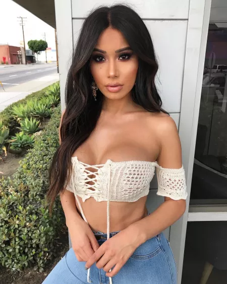 Janet Guzman in crochet top by WhoredrobeMod