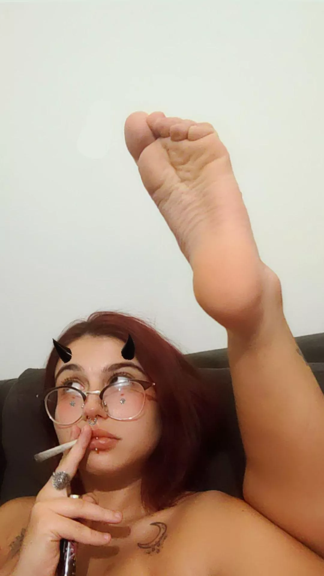 Just smoking 🤭 posted by daddys_lil_sin