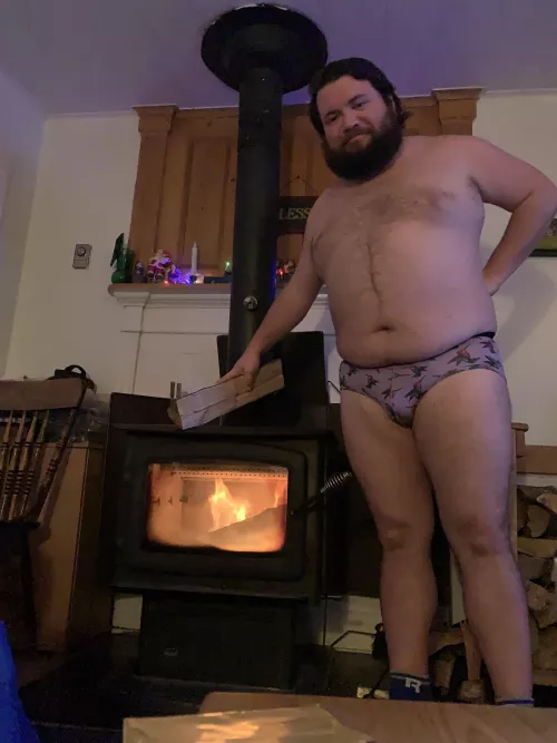 Keeping the fire going. by ASundayDrive