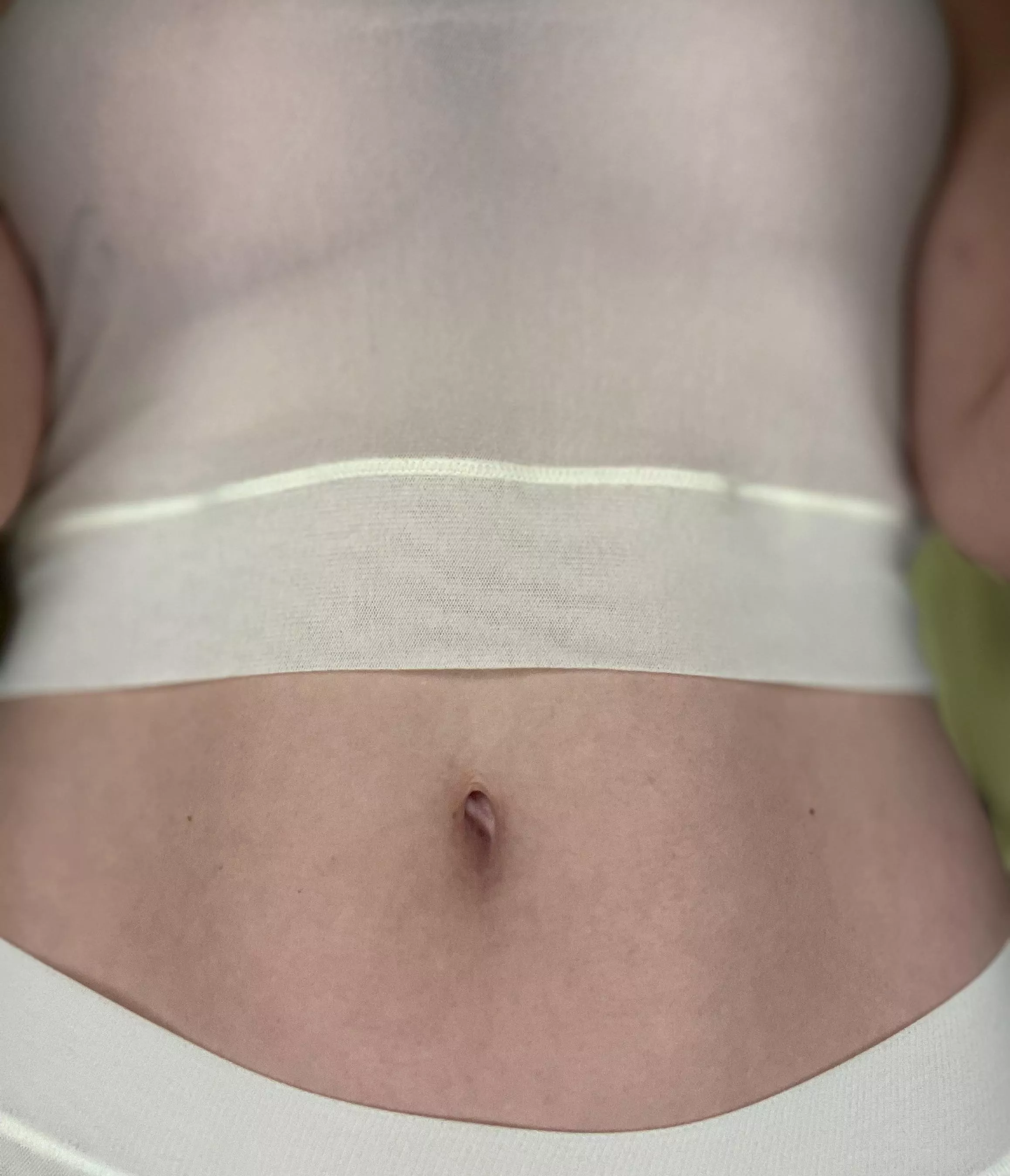 Kind of a tease in this sheer top. posted by betterbeclaire