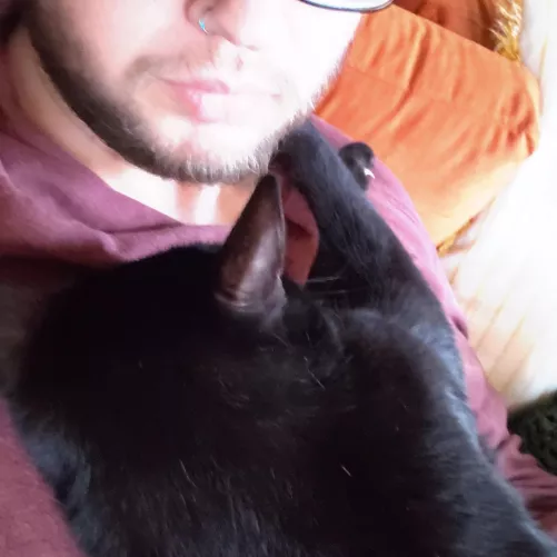 Kneedy, needy little guy. Can't be without me holding him, even when working. by Omin_Covenant