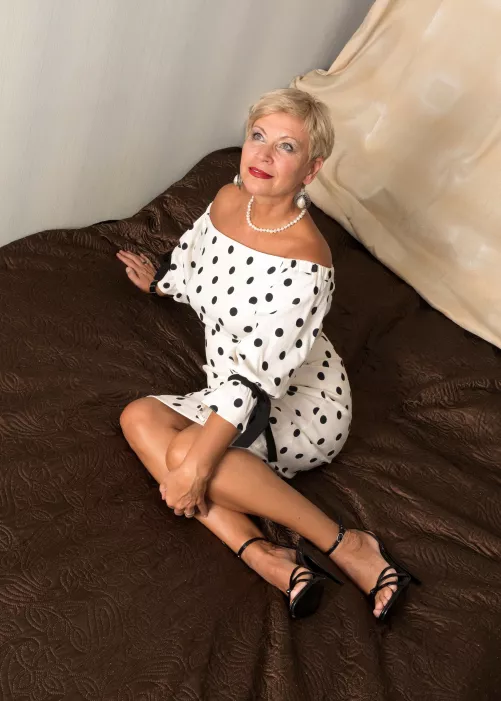 Lady on the couch in polka dot dress and heels [size 6US] by sexyfeetexpo