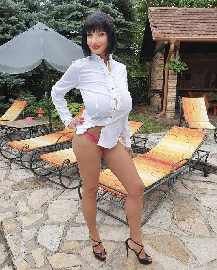 Leggy, busty, and straining those buttons! posted by FizzyOrangeJuice