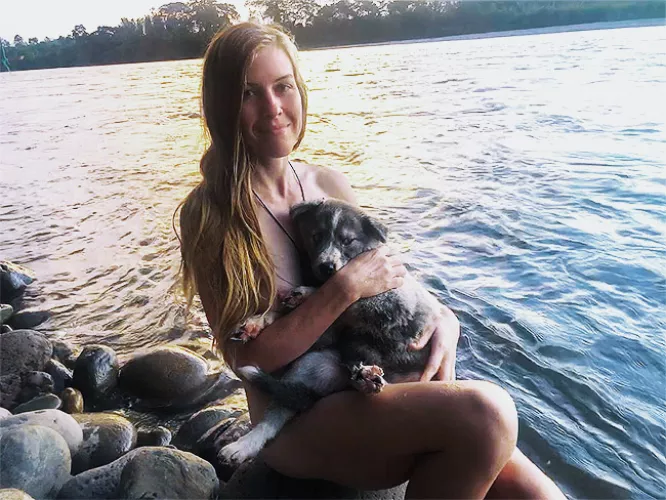 Little fluffer playing in the river by Astraelucifera