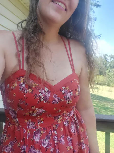 Little red floral sundress and long wind tossed hair. What more can you ask for other than sliding the straps off and slipping it down my body by msjanejenkins