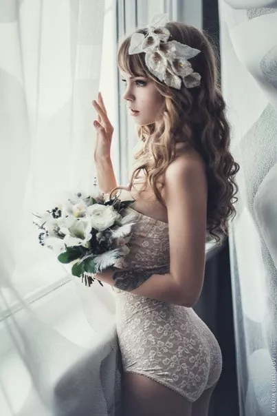 Looking out of the window in her wedding undies. Sorta SFW posted by [deleted]