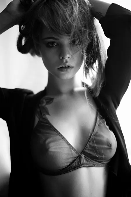 Looking to camera in her bra. by [deleted]