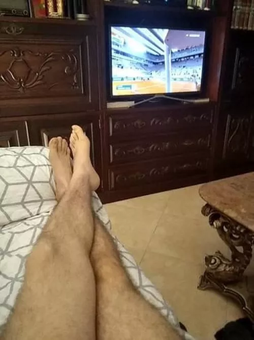 Lounging and watching sports 🎾 by PortugueseFeetLover