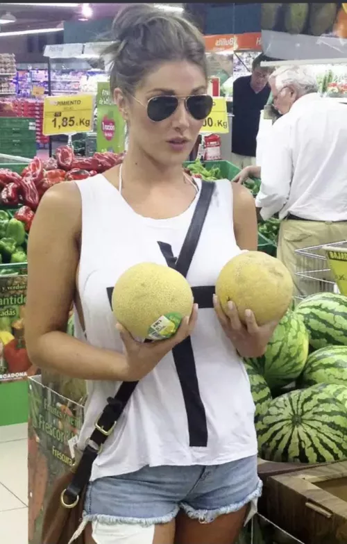 Lucy holding her melons by fcazaldo