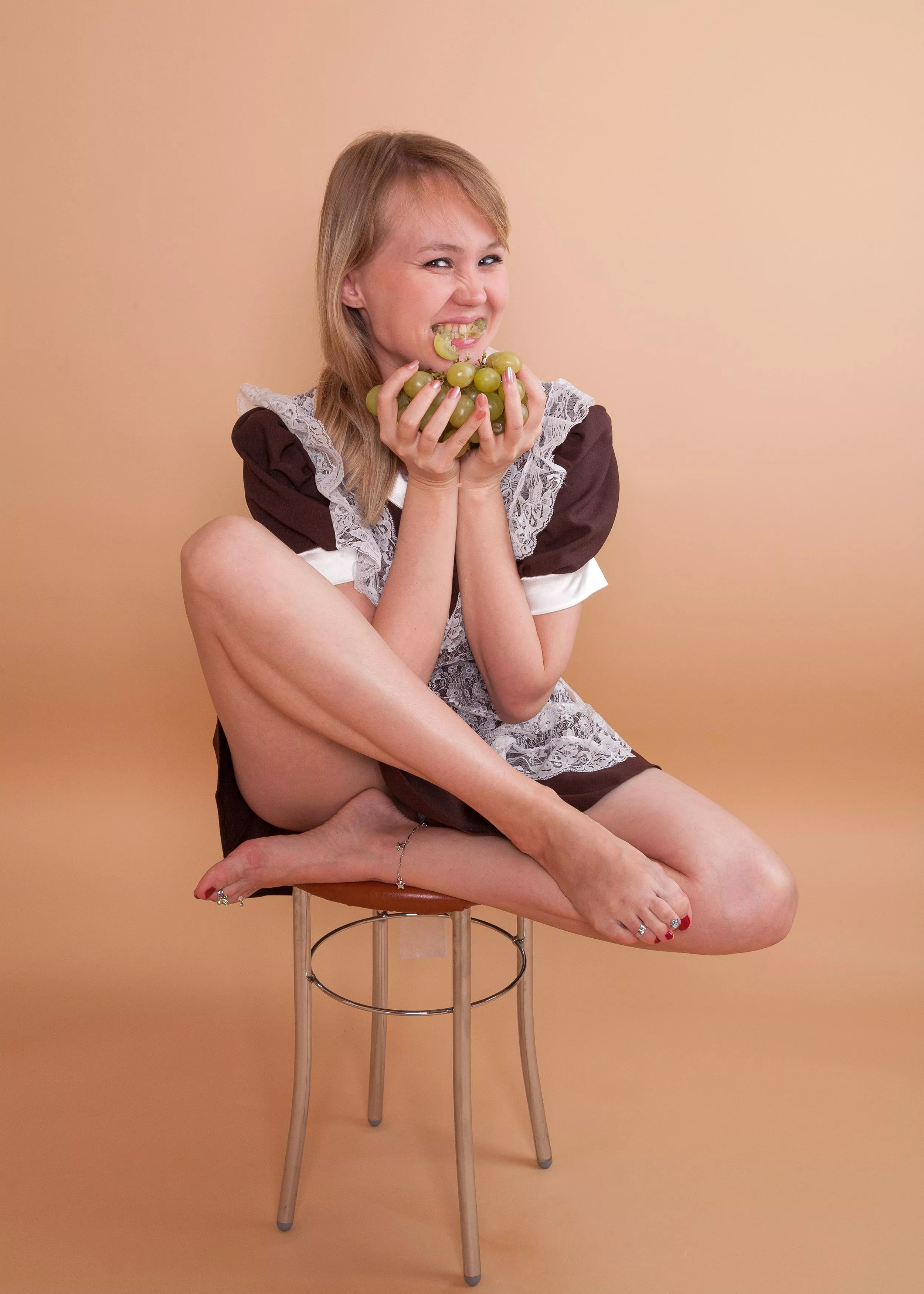 Maids are crazy about grapes posted by sexyfeetexpo