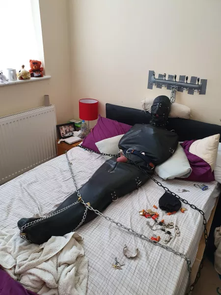 Me all sleepsacked in rubber suit, chained & padlocked & handcuffed & collared & gagged in chastity for god knows how long while my partner was at work with the keys ;) by jimbob0702