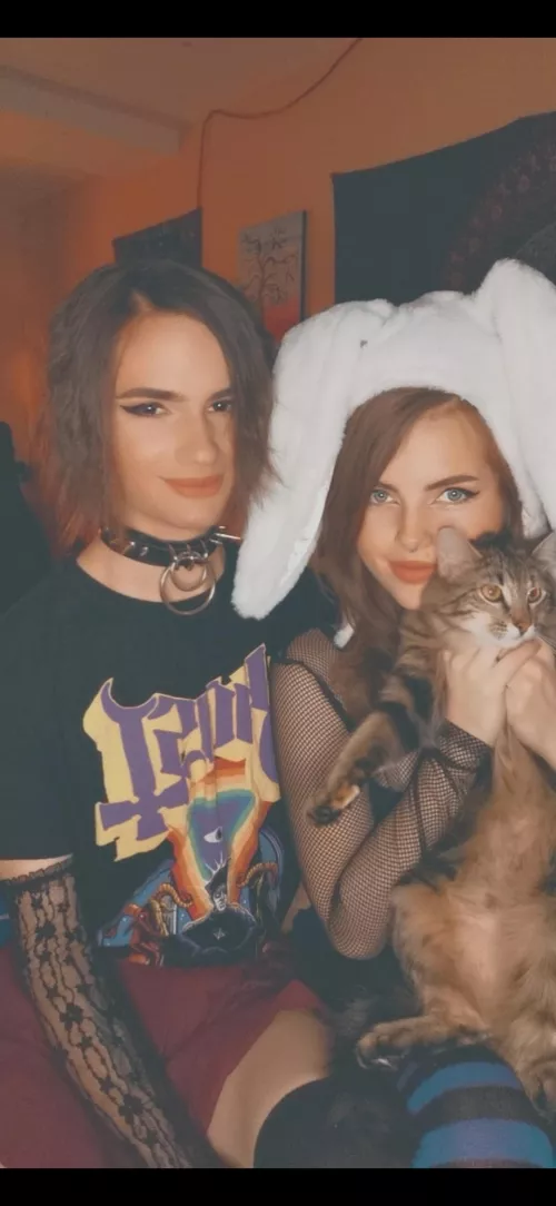 Me and my gf chilling with her cat Bingy. My gfs Reddit is gonna be in the comments, give her a follow too! by Cherubindrew10
