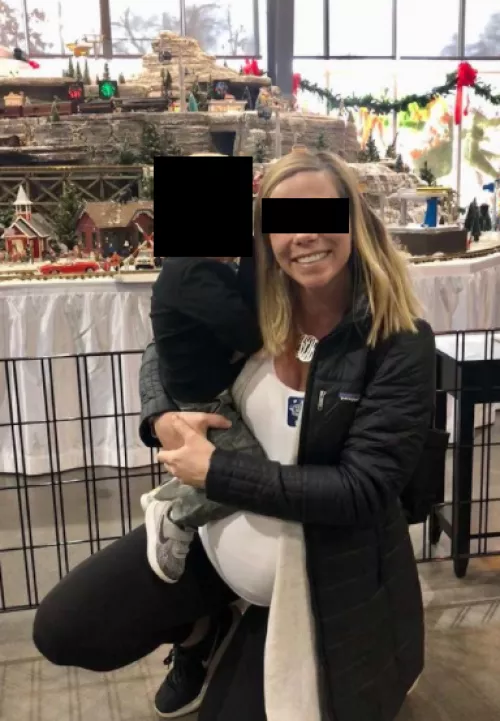 Me holding my second youngest while 9 months pregnant. Hubby spent about $500 on us that day while baby daddy relaxed at home lol! by icuckmyhusband