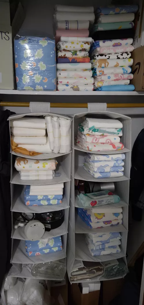 Moved in with GF, got my first open stash! (The ones at the top are a collection of one of all the diapers I've had) by Lonti90