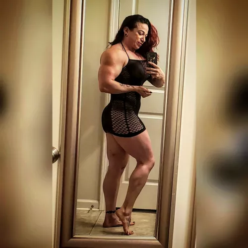 Muscle and a little black dress 🖤 by Feeling-Ad-3894